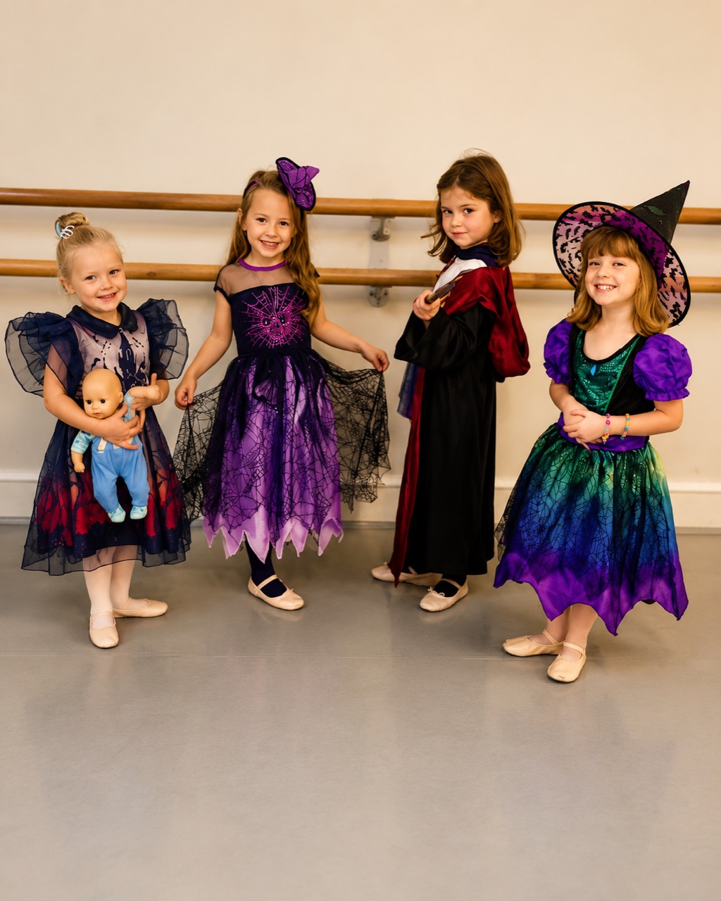 Young ballet students in dressing-up costumes at the studio