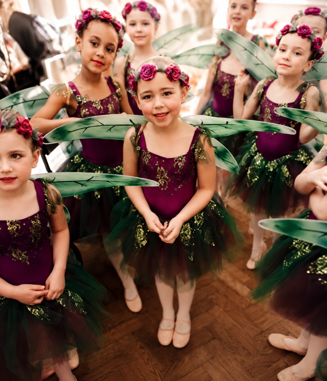 Young dancers in performance costumes